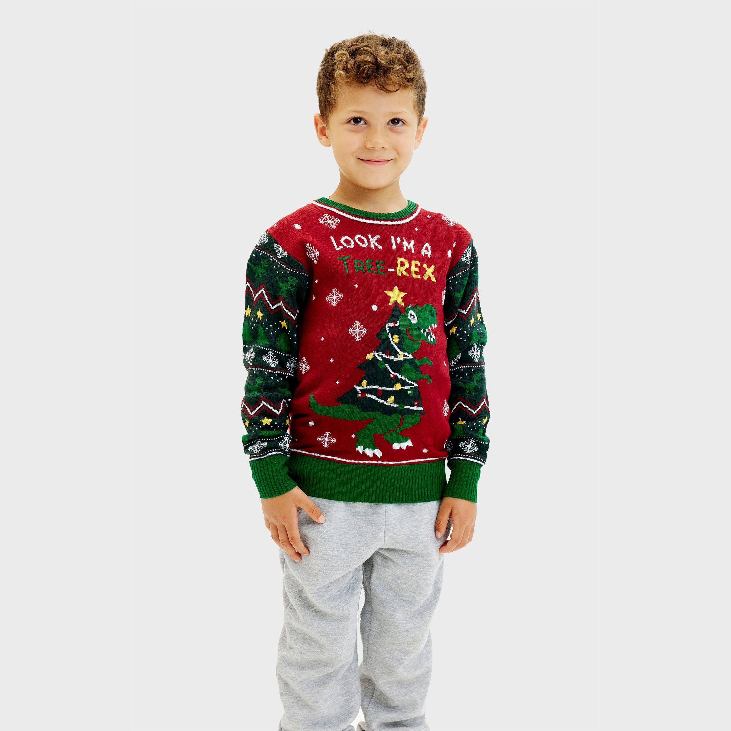Kinder Weihnachtspullover in Rot und Grün mit Dinosaurier und Tannenbaum Motiv, Weihnachtsdesign.